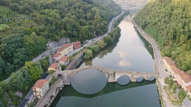 Aerial view of Ponte della Maddalena (Devil's Bridge) and the Serchio river, near Borgo a Mozzano, in the Lucca province.