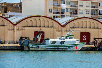 Beautiful long white boat in the port of Gandia, Spain	
