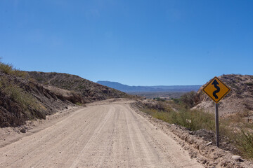 Dirt road at Route 40 in the Calchaqui Valley, Argentina. Section of the route between Cachi and...
