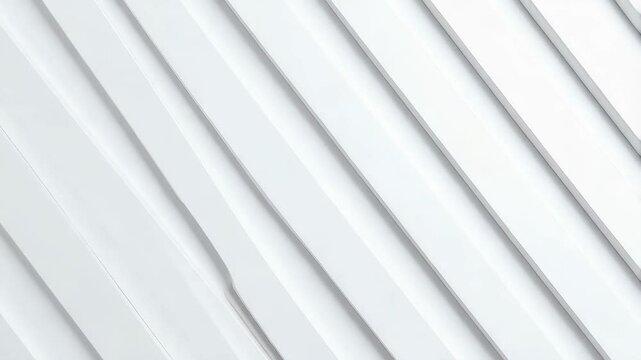 Minimalist white abstract architectural detail featuring parallel diagonal geometric shapes and cast shadows for modern texture backdrop.