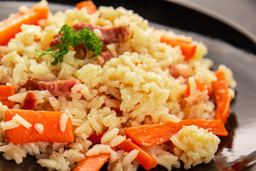 Rice meat and vegetables pilaf fresh delicious gourmet food background on the table rustic food top view copy space