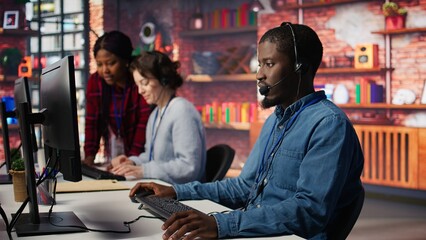 Account management team coworkers in office bonding with clients to generate leads. Teamworking colleagues talking with customers to identify new sales opportunities, camera B close up