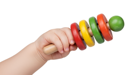 Baby hand holding wooden toy isolated on white background