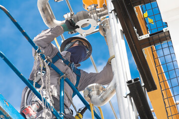 Telecom worker on a man lift