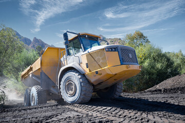 Articulated dump truck on a construction site. © Edward Carreon