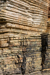 Iconic natural rock formations of Playa de las Catedrales beach in Ribadeo, Lugo, Galicia, Spain, captured during low tide. A breathtaking seascape with caves and arches.