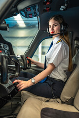 Female pilot sitting in cockpit and preparing for takeoff