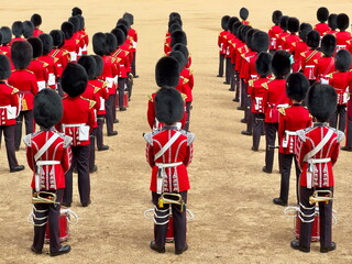trooping the colour king's guards drummers and bugle  on parade in traditional red army uniform and...