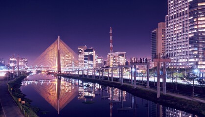 An urban cityscape with the cable-stayed bridge in Sao Paulo city.