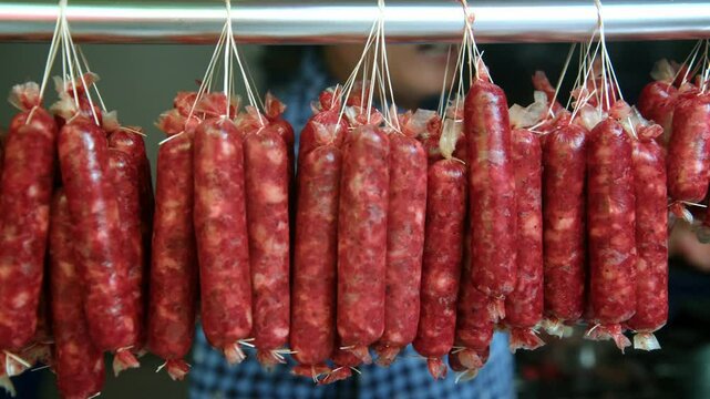 Raw Filipino Longganisa Sausages Hanging on Display