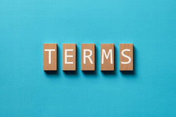 Obraz premium There is wood block with the word TERMS. It is as an eye-catching image.