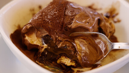 Close up of spoon scooping delicious tartufo ice cream dessert, a typical product of Pizzo Calabro, Italy