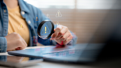 User inspecting warning signs through a magnifying glass on a virtual interface, representing data risk analysis, cybersecurity threats, system error detection, and digital security monitoring.