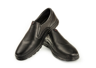 formal black shoes close up on white background, men's fashion shoes close up