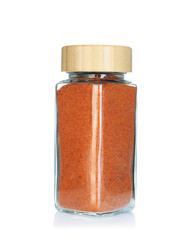 Paprika in spice jar isolated on white