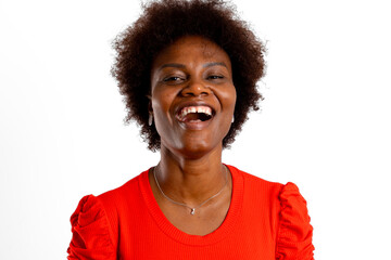 Face of young latin woman smiling toothy looking at camera on white background
