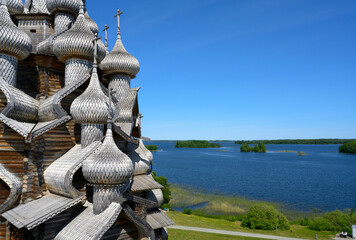 Aerial view of domes and crosses of medieval wooden Church of the Transfiguration of the Lord built in 1714 on Kizhi Island on Onega Lake in Karelia