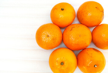 Minimalist Composition of Seven Oranges