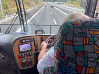 Bus driver driving on motorway
