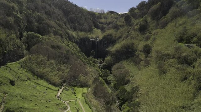 Drone lowers over Parque de Merendas do Fojo in the valley near Salto da Farinha in Sao Miguel, Azores, Portugal