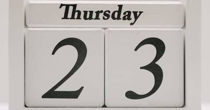 Timelapse of a white calendar counting up the days. Great for concepts like time, deadlines, meetings, and planning. White Calendar Date Timelapse