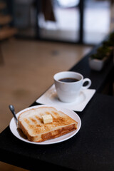 Coffee and bread toast a perfect breakfast scene.
