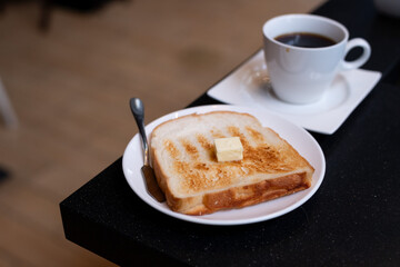 Coffee and bread toast a perfect breakfast scene.