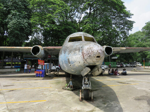 A rusting old jet plane in a car park in Yangon, Myanmar