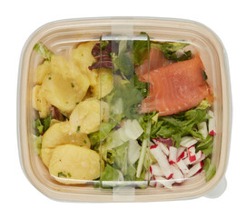 Vegetable salad in plastic box with clear lid, top view cut out isolated transparent background