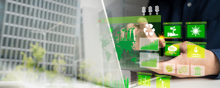 Sustainable energy technology and green environment concept with eco-friendly icons on futuristic digital screen