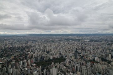 Vast urban landscape of Sao Paulo with cloudy sky and city skyline views