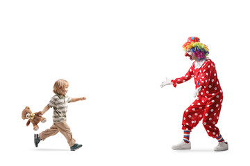 Boy running to hug a clown