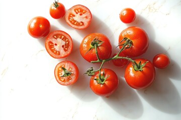 Bright red fresh tomatoes on vine and sliced tomatoes on white marble surface with water droplets under natural light