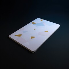A closed notebook with a geometric pattern
