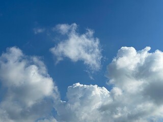 white clouds in the blue sky