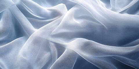 Obraz premium Close-up view of light blue sheer fabric with soft, elegant draping.