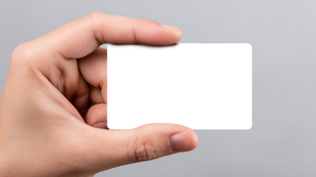 Finger tips holding up a clear white paper, isolated on transparent background for easy use.