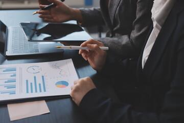 Accounting company provide finance and taxation planning for profitable cash flow, Auditor and accountant team working in office, analyze financial data and accounting record with calculator.Insight