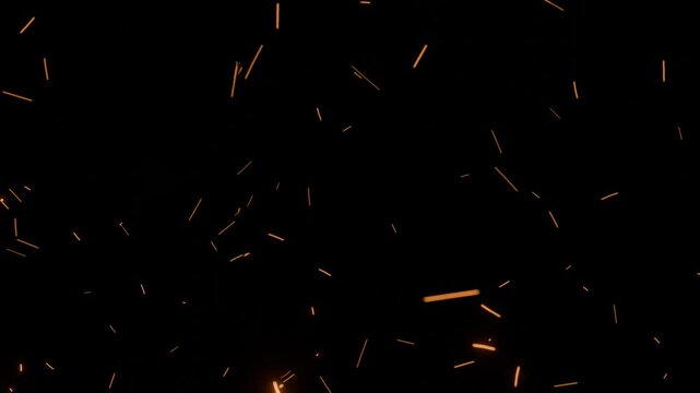Animated glowing sparks flying across a dark background. Perfect for cinematic transitions, fire effects, or abstract ambient visuals in sci-fi or action scenes.