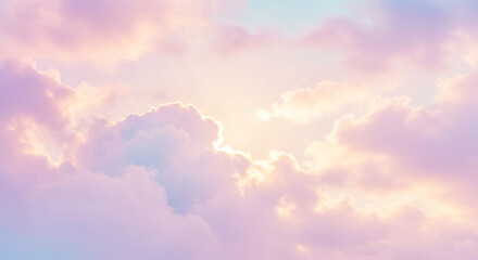 Beautiful fluffy clouds in the sky at sunset with dreamy colors and sunlight