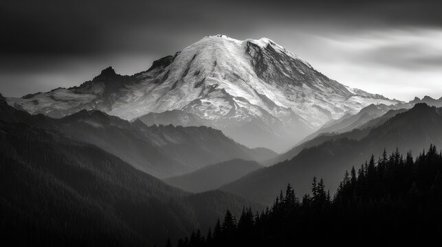Majestic snow-capped mountain range in monochrome.