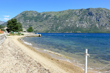 Shingle beach and mountains on the Bay of Kator