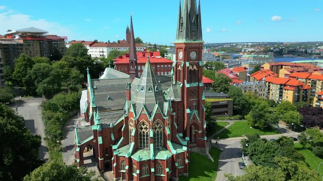 Gothenburg, Sweden - April 20, 2024: Aerial view of Oscar Fredrik Church - city in Sweden. Olivedal district landmark - Oscar Fredrik Church. Neo Gothic architecture style. Drone recording. Cityscape 