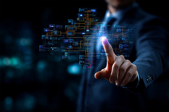 A businessman interacts with an advanced digital interface, depicting various data charts. - Powered by Adobe