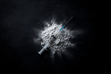 A stark representation of addiction, featuring a syringe resting on a mound of powder, emphasizing the dangers associated with drug use and the urgent need for awareness and prevention.