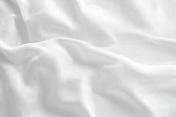 Fototapeta premium Soft white fabric with gentle folds and wrinkles creating a smooth and delicate texture under diffused lighting