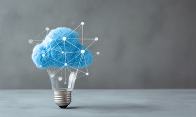 Light bulb with blue cloud and social network on a grey background, concept of an online community in business, with a white aesthetic background.