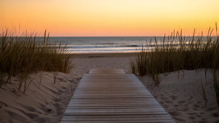 Naklejka premium A serene beach boardwalk photograph during sunset