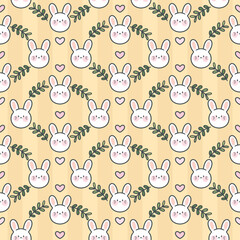 Obraz premium Seamless pattern consisting of cute little bunnies, hearts and hand drawn leaves, perfect for fabric and wall decoration.