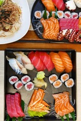 Closeup of fresh sushi on ceramic dish, Japanese food